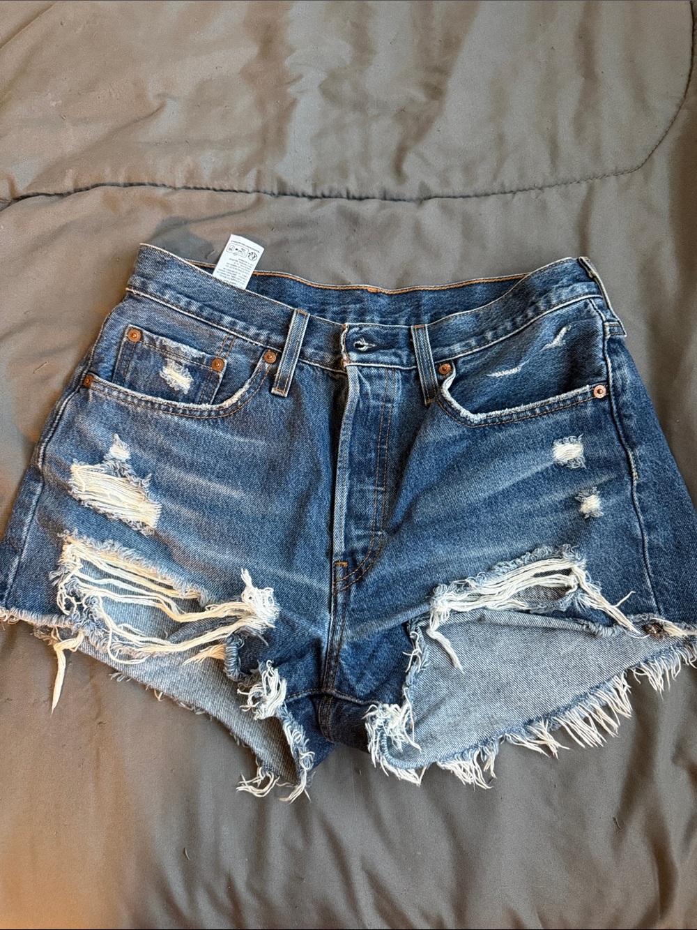 Levi's Distressed Dark Blue Cutoff Jean Shorts